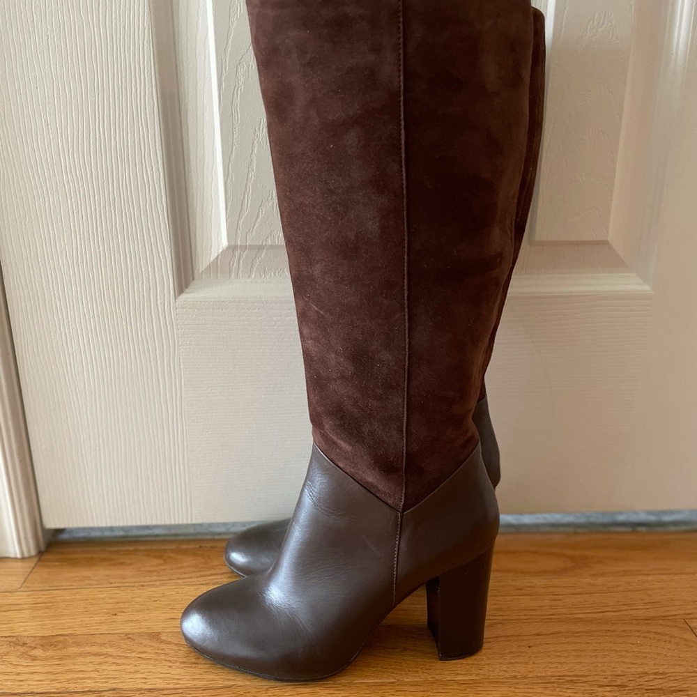 Tall brown leather boots.